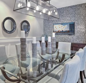 Apartments in The Heights Houston Welcome to a dining room featuring a glass table and chairs.